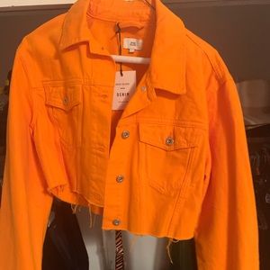 Orange cropped jean jacket